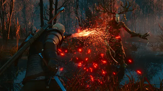 Geralt casts a fiery Sign toward a forest creature